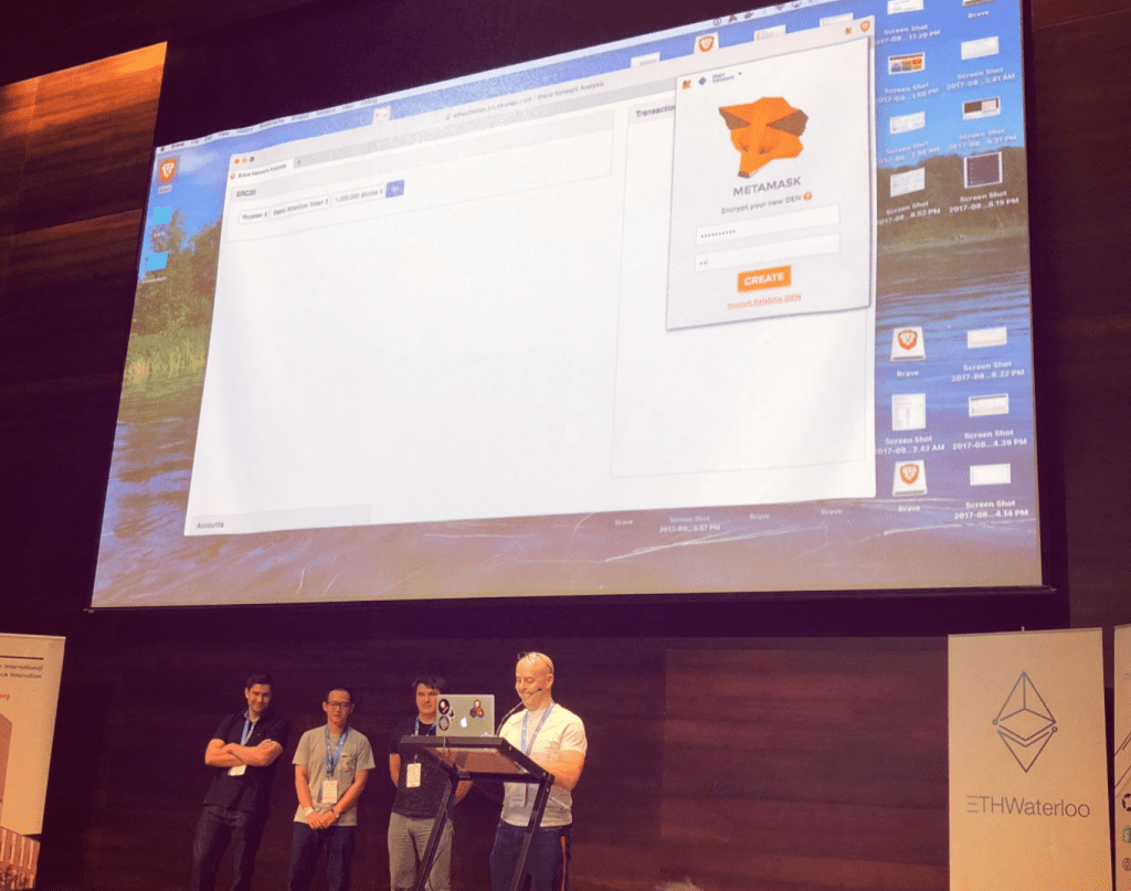 Aubrey Keus, Sergey Zhukovsky, Anthony Tseng, and Kamil Jozwiak presenting onstage.